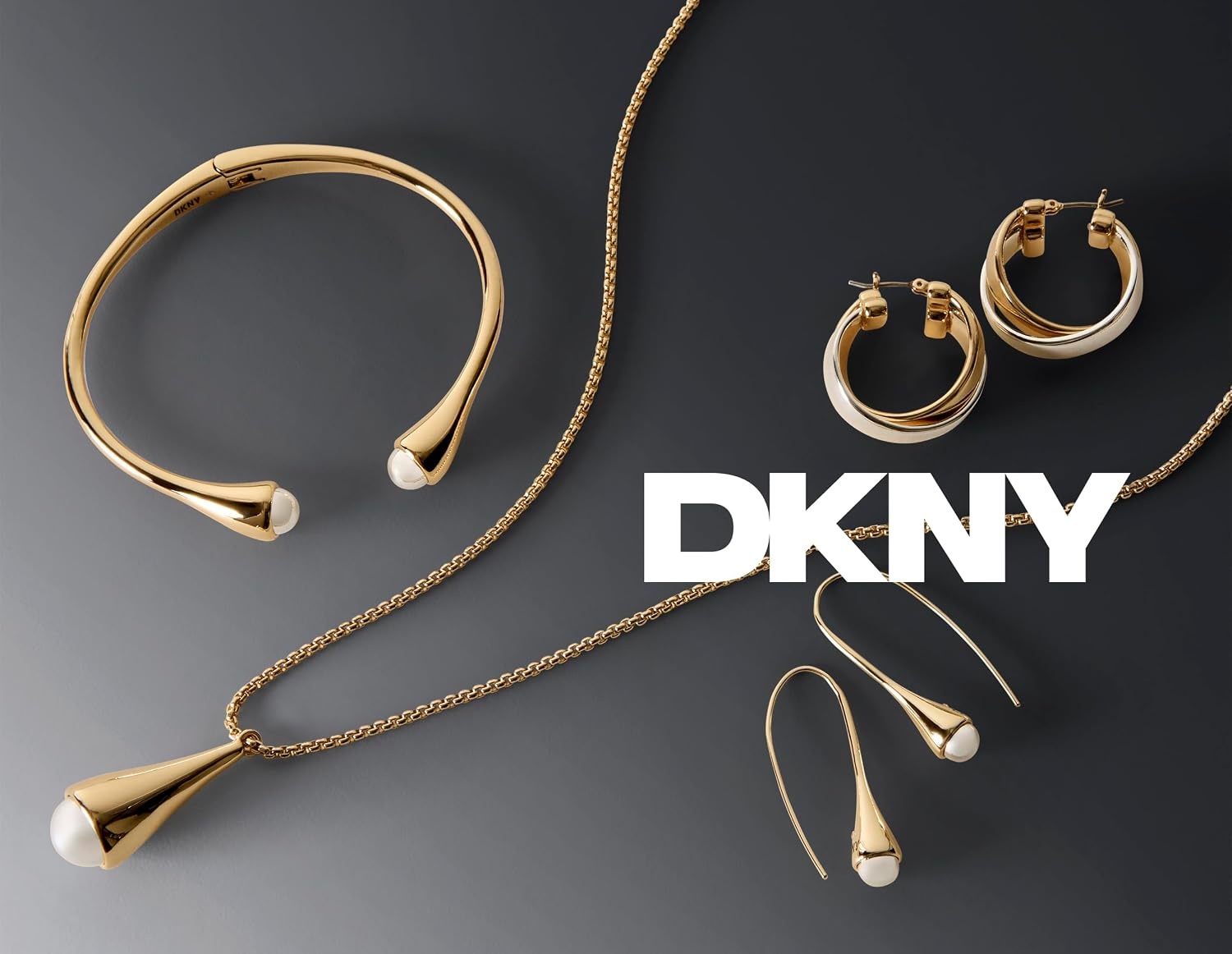 image:imageDKNY GoldTone Micropav Linear Drop Earrings Beautiful Womens Jewelry GoldTone amp Crystal Dangle Earrings