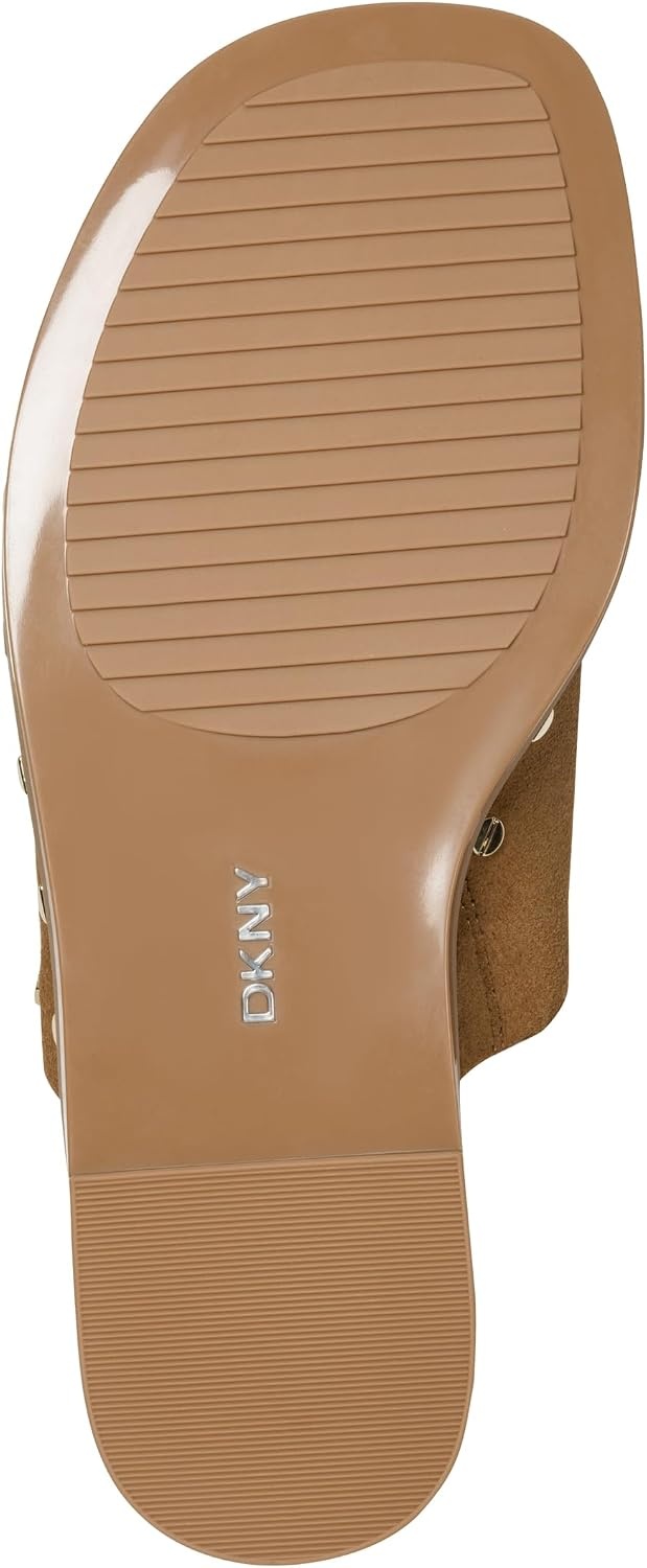 image:imageDKNY womens Colwyn Flat Sandal With Toe Loop and Stud EmbellishmentsAmber