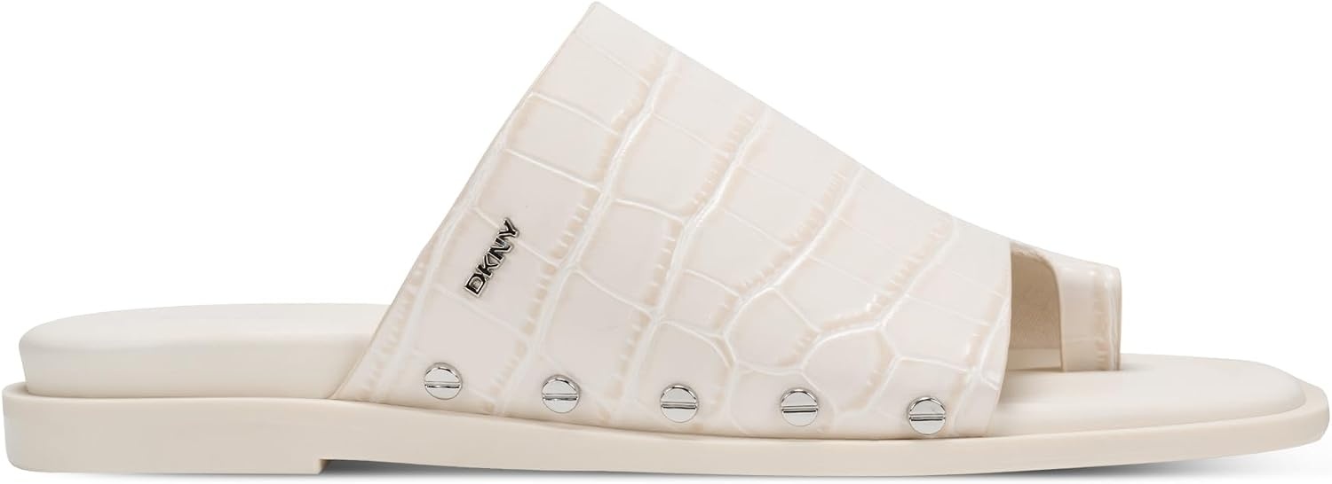 image:imageDKNY womens Colwyn Flat Sandal With Toe Loop and Stud EmbellishmentsCoconut