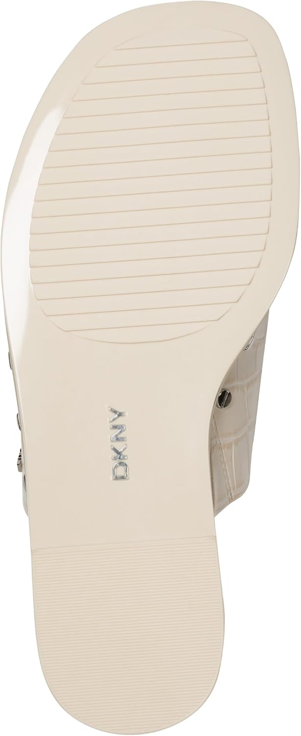 image:imageDKNY womens Colwyn Flat Sandal With Toe Loop and Stud EmbellishmentsCoconut
